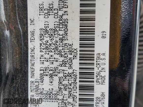 2013 Toyota Tundra z VIN 5TFUM5F1XDX046077, wystawiony jako Copart lot #65893365 z przebiegiem 240 153 mil mil oraz Szkoda całkowita • Salvage title. Historia ofert i sprzedaży dostępna na DreamBid. Obrazek 13.