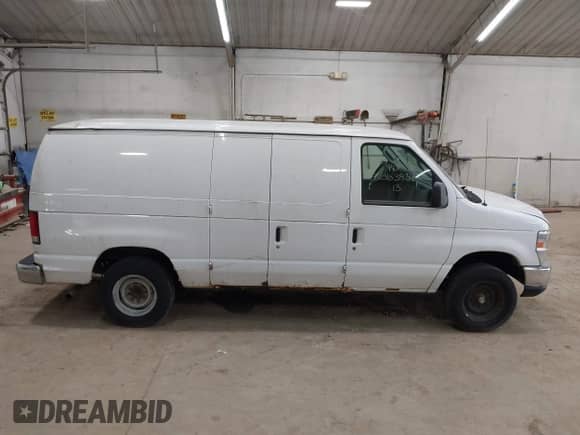 2013 Ford Econoline Cargo Commercial with VIN 1FTNE1EW6DDA04241, listed as a IAAI auction lot 42503937 with 167,333 mi miles and . Bid and sale history available at DreamBid. Image 13.