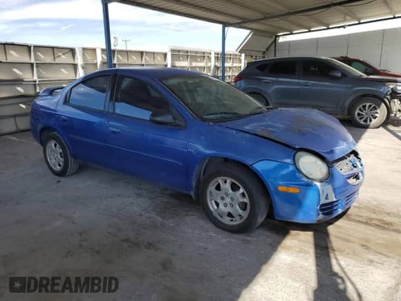 2005 Dodge Neon SXT with VIN 1B3ES56C75D229727, listed as a Copart auction lot 79717284 with 152,739 mi miles and Salvage title. Bid and sale history available at DreamBid. Image 4.