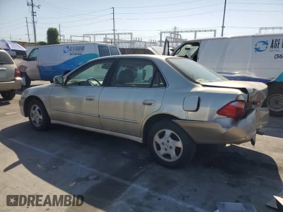2000 Honda Accord EX z VIN JHMCG6685YC003686, wystawiony jako Copart lot #51540365 z przebiegiem 190 406 mil mil oraz Szkoda całkowita • Salvage title. Historia ofert i sprzedaży dostępna na DreamBid. Obrazek 2.