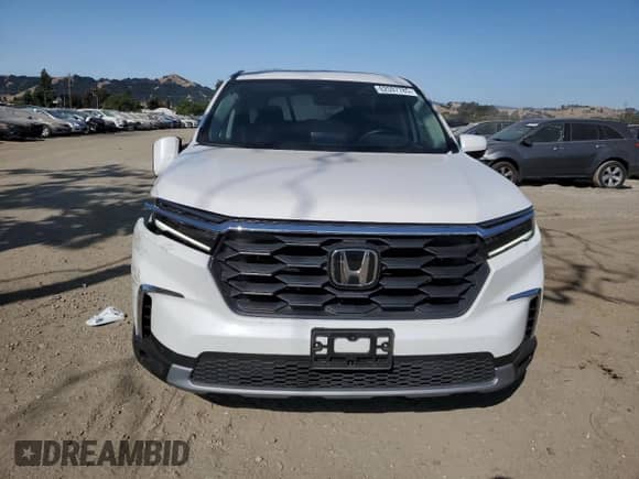 2024 Honda Pilot EX-L с VIN 5FNYG2H46RB005932, выставлен на аукционе Copart как лот 62597785 с пробегом 28 099 миль миль и Списание • Salvage title. История ставок и продаж доступна на DreamBid. Изображение 5.