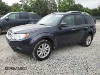 2012 Subaru Forester X Touring z VIN JF2SHBGC4CH452053, wystawiony jako Copart lot #61257385 z przebiegiem 141 069 mil mil oraz Szkoda całkowita • Salvage title. Historia ofert i sprzedaży dostępna na DreamBid. Obrazek 1.