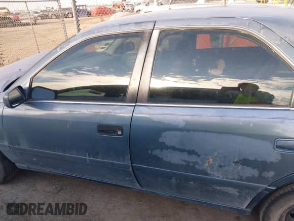 2001 Toyota Camry CE with VIN 4T1BG22K61U856097, listed as a IAAI auction lot 43319135 with Not provided miles and . Bid and sale history available at DreamBid. Image 14.