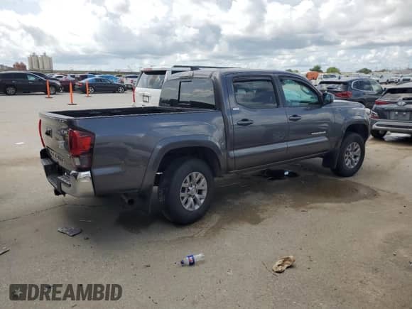 2019 Toyota Tacoma TRD Sport with VIN 5TFAZ5CN4KX078788, listed as a Copart auction lot 59543625 with 66,302 mi miles and Salvage title. Bid and sale history available at DreamBid. Image 3.
