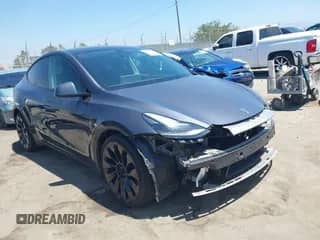 2022 Tesla Model Y Performance with VIN 7SAYGDEF3NF532101, listed as a IAAI auction lot 42894449 with 57,275 mi miles and . Bid and sale history available at DreamBid. Image 1.