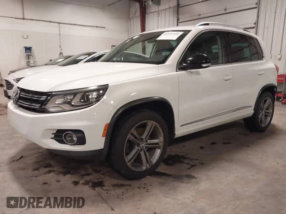 2017 Volkswagen Tiguan Sport with VIN WVGUV7AXXHK019674, listed as a IAAI auction lot 41374050 with 104,821 mi miles and . Bid and sale history available at DreamBid. Image 20.