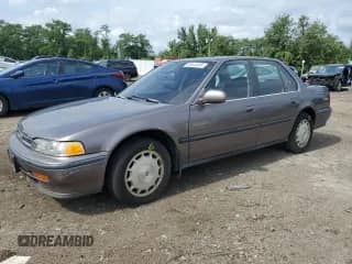 1992 Honda Accord с VIN JHMCB7677NC030234, выставлен на аукционе Copart как лот 68844485 с пробегом 73 256 миль миль и Списание • Salvage title. История ставок и продаж доступна на DreamBid. Изображение 1.