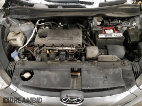 2012 Hyundai Tucson Limited z VIN KM8JUCAC8CU397436, wystawiony jako Copart lot #88436465 z przebiegiem 166 018 mil mil oraz Szkoda całkowita • Salvage title. Historia ofert i sprzedaży dostępna na DreamBid. Obrazek 13.