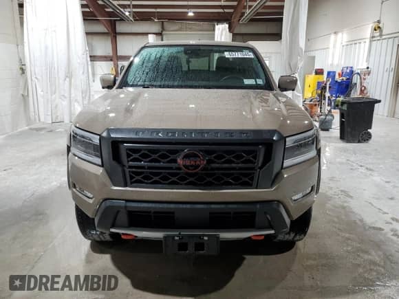 2023 Nissan Frontier SV with VIN 1N6ED1EK7PN660492, listed as a Copart auction lot 65771045 with 32,688 mi miles and Salvage title. Bid and sale history available at DreamBid. Image 5.