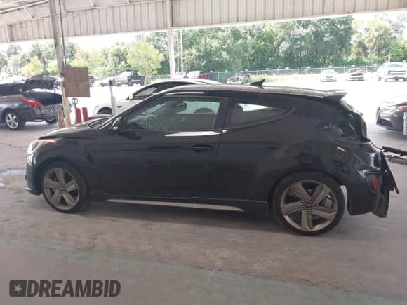 2013 Hyundai Veloster Turbo с VIN KMHTC6AEXDU167848, выставлен на аукционе IAAI как лот 43353403 с пробегом 84 077 миль миль и . История ставок и продаж доступна на DreamBid. Изображение 15.