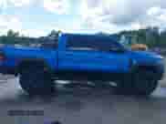 2021 Ram 1500 TRX with VIN 1C6SRFU98MN804461, listed as a IAAI auction lot 42300032 with 28,735 mi miles and . Bid and sale history available at DreamBid. Image 13.