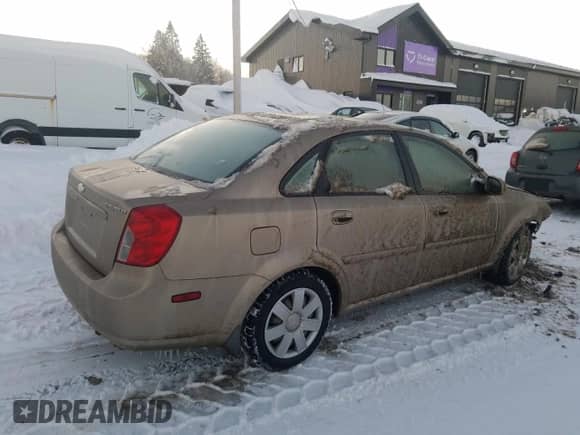 2004 Chevrolet Optra с VIN KL1JD52Z44K944399, выставлен на аукционе Copart как лот 83368844 с пробегом Не указан миль и Списание • Salvage title. История ставок и продаж доступна на DreamBid. Изображение 3.