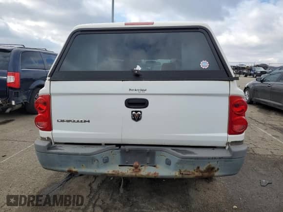 2008 Dodge Dakota z VIN 1D3HW22K18S638485, wystawiony jako Copart lot #86774214 z przebiegiem 189 304 mil mil oraz Szkoda całkowita • Salvage title. Historia ofert i sprzedaży dostępna na DreamBid. Obrazek 6.