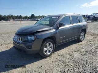 2017 Jeep Compass Sport with VIN 1C4NJDBB4HD144079, listed as a Copart auction lot 82115265 with 124,105 mi miles and Salvage title. Bid and sale history available at DreamBid. Image 1.