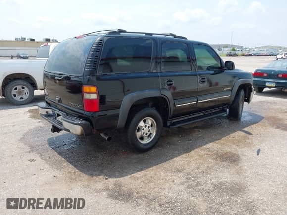 2002 Chevrolet Tahoe Z71 z VIN 1GNEK13Z72R226297, wystawiony jako IAAI lot #42812667 z przebiegiem 329 117 mil mil oraz . Historia ofert i sprzedaży dostępna na DreamBid. Obrazek 4.