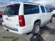 2010 Chevrolet Suburban LT z VIN 1GNUCJE05AR210539, wystawiony jako IAAI lot #41805107 z przebiegiem 166 305 mil mil oraz . Historia ofert i sprzedaży dostępna na DreamBid. Obrazek 4.