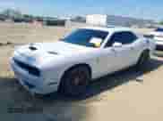 2016 Dodge Challenger SRT Hellcat with VIN 2C3CDZC99GH239296, listed as a IAAI auction lot 42057592 with 63,826 mi miles and . Bid and sale history available at DreamBid. Image 2.