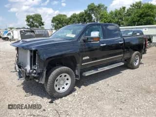 2018 Chevrolet Silverado 2500HD High Country с VIN 1GC1KXEY6JF201695, выставлен на аукционе Copart как лот 61934235 с пробегом 72 761 миль миль и Списание • Salvage title. История ставок и продаж доступна на DreamBid. Изображение 1.