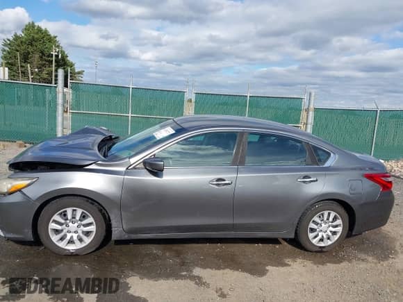 2016 Nissan Altima S z VIN 1N4AL3AP5GC255461, wystawiony jako IAAI lot #43392771 z przebiegiem 321 863 mil mil oraz . Historia ofert i sprzedaży dostępna na DreamBid. Obrazek 14.