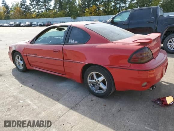 1999 Pontiac Grand Am GT z VIN 1G2NW12E2XM868334, wystawiony jako Copart lot #77085924 z przebiegiem Nie podano mil oraz Szkoda całkowita • Salvage title. Historia ofert i sprzedaży dostępna na DreamBid. Obrazek 2.