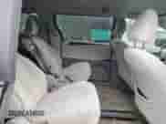 2014 Toyota Sienna LE with VIN 5TDKK3DC6ES455352, listed as a Copart auction lot 82415215 with 180,284 mi miles and Salvage title. Bid and sale history available at DreamBid. Image 11.