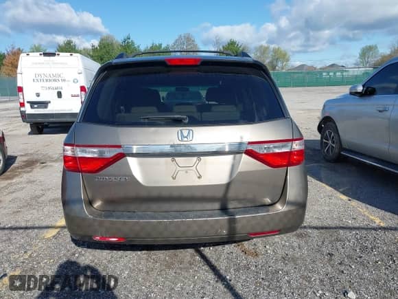 2012 Honda Odyssey LX z VIN 5FNRL5H29CB091860, wystawiony jako IAAI lot #42000688 z przebiegiem 295 551 mil mil oraz . Historia ofert i sprzedaży dostępna na DreamBid. Obrazek 16.