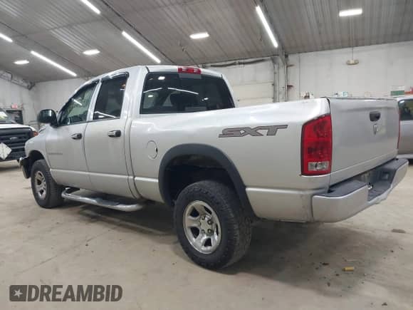 2003 Dodge 1500 ST with VIN 1D7HU18N03S373020, listed as a IAAI auction lot 42947731 with 310,657 mi miles and . Bid and sale history available at DreamBid. Image 3.