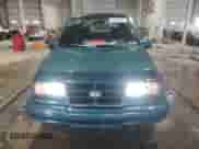 1996 Chevrolet Tracker с VIN 2CNBJ1869T6903842, выставлен на аукционе Copart как лот 87734315 с пробегом 120 835 миль миль и Списание • Salvage title. История ставок и продаж доступна на DreamBid. Изображение 5.