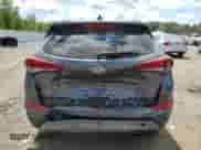 2018 Hyundai Tucson Limited with VIN KM8J3CA27JU677582, listed as a Copart auction lot 69106765 with 99,346 mi miles and Salvage title. Bid and sale history available at DreamBid. Image 6.