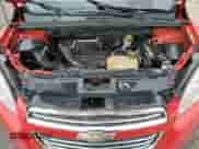 2016 Chevrolet Trax LT z VIN KL7CJPSB4GB751504, wystawiony jako Copart lot #82018265 z przebiegiem 168 016 mil mil oraz Czysty tytuł • Clean title. Historia ofert i sprzedaży dostępna na DreamBid. Obrazek 12.