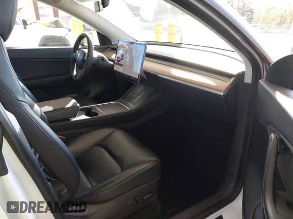 2021 Tesla Model Y Long Range with VIN 5YJYGDEE6MF138868, listed as a IAAI auction lot 43401839 with 134,786 mi miles and . Bid and sale history available at DreamBid. Image 5.