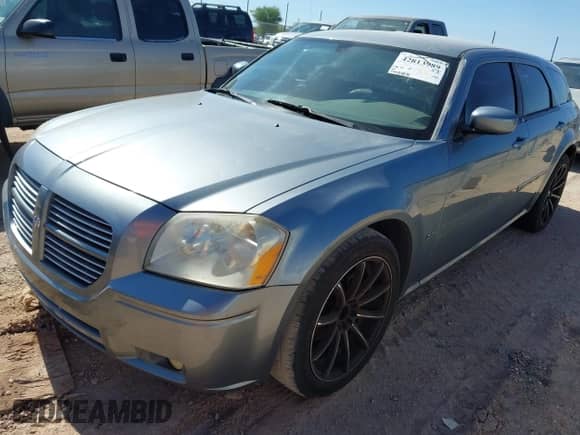 2007 Dodge Magnum with VIN 2D4FV47V67H687501, listed as a IAAI auction lot 42813989 with 144,058 mi miles and . Bid and sale history available at DreamBid. Image 2.
