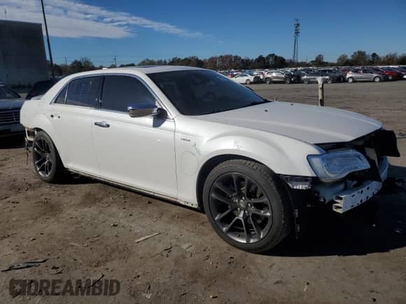 2015 Chrysler 300 C with VIN 2C3CCAET9FH922210, listed as a Copart auction lot 80310864 with 118,931 mi miles and Salvage title. Bid and sale history available at DreamBid. Image 4.