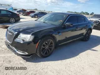 2013 Chrysler 300 C with VIN 2C3CCAET9DH670813, listed as a Copart auction lot 82469405 with 125,098 mi miles and Clean title. Bid and sale history available at DreamBid. Image 1.
