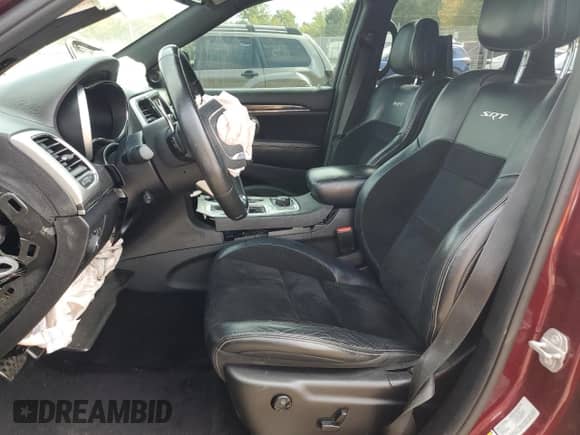 2016 Jeep Grand Cherokee SRT with VIN 1C4RJFDJ2GC373382, listed as a Copart auction lot 81557365 with 98,697 mi miles and Salvage title. Bid and sale history available at DreamBid. Image 7.