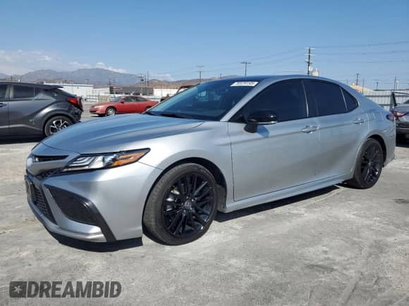 2022 Toyota Camry Hybrid XSE с VIN 4T1K31AK0NU044226, выставлен на аукционе Copart как лот 70329195 с пробегом 59 984 миль миль и Чистый • Clean title. История ставок и продаж доступна на DreamBid. Изображение 1.