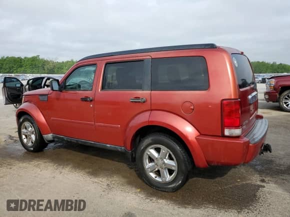 2008 Dodge Nitro SLT with VIN 1D8GT58K88W121992, listed as a Copart auction lot 54328795 with 189,663 mi miles and Salvage title. Bid and sale history available at DreamBid. Image 2.