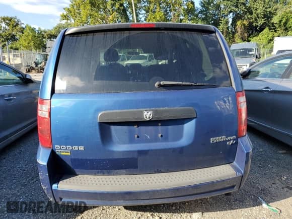 2010 Dodge Grand Caravan Cargo with VIN 2D4RN1AE3AR348801, listed as a Copart auction lot 68098685 with 313,499 mi miles and Clean title. Bid and sale history available at DreamBid. Image 6.
