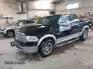 2014 Ram 1500 Laramie z VIN 1C6RR7NM2ES476528, wystawiony jako IAAI lot #42309574 z przebiegiem 150 307 mil mil oraz . Historia ofert i sprzedaży dostępna na DreamBid. Obrazek 2.