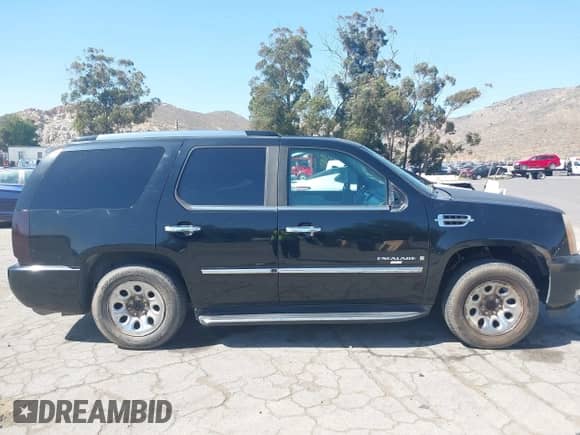 2007 Cadillac Escalade z VIN 1GYEC63887R281627, wystawiony jako IAAI lot #42312945 z przebiegiem Nie podano mil oraz . Historia ofert i sprzedaży dostępna na DreamBid. Obrazek 13.