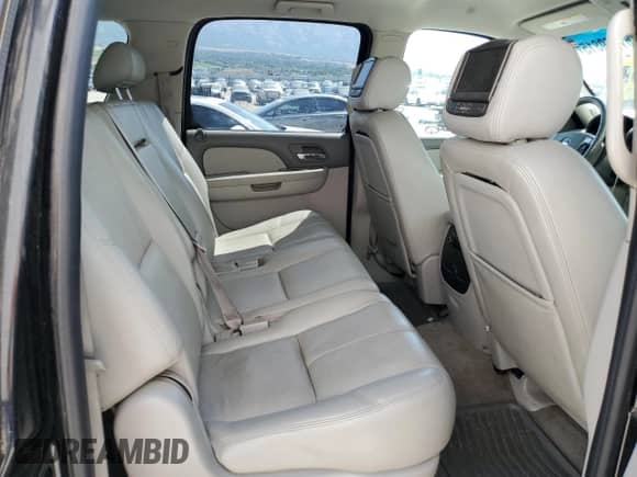2009 Chevrolet Suburban 2LT with VIN 1GNFK26399R300007, listed as a Copart auction lot 61559815 with 195,033 mi miles and Salvage title. Bid and sale history available at DreamBid. Image 11.