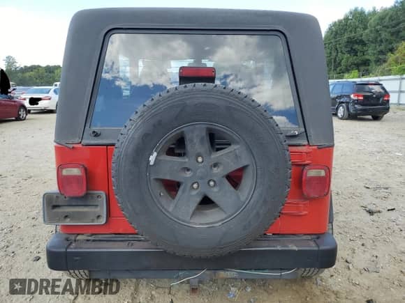 1997 Jeep Wrangler SE with VIN 1J4FY29P2VP473972, listed as a Copart auction lot 70339135 with 243,412 mi miles and Salvage title. Bid and sale history available at DreamBid. Image 6.