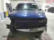 2000 Chevrolet Blazer LS z VIN 1GNCS13W7YK297644, wystawiony jako Copart lot #70089505 z przebiegiem 264 962 mil mil oraz Szkoda całkowita • Salvage title. Historia ofert i sprzedaży dostępna na DreamBid. Obrazek 5.
