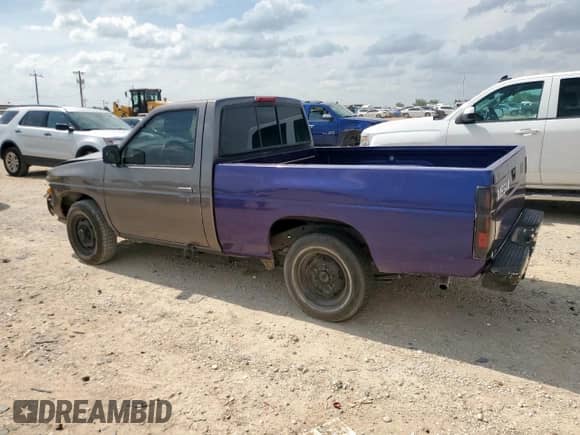 1996 Nissan Frontier XE with VIN 1N6SD11S2TC337322, listed as a Copart auction lot 59141775 with 174,109 mi miles and Salvage title. Bid and sale history available at DreamBid. Image 2.