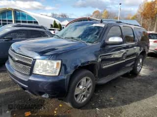 2009 Chevrolet Suburban LTZ z VIN 1GNFK36309R243475, wystawiony jako Copart lot #90379995 z przebiegiem 168 390 mil mil oraz Szkoda całkowita • Salvage title. Historia ofert i sprzedaży dostępna na DreamBid. Obrazek 1.