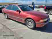 1999 BMW 5 Series 528i с VIN WBADM6333XBY20082, выставлен на аукционе Copart как лот 81728785 с пробегом Не указан миль и На запчасти • Non repairable. История ставок и продаж доступна на DreamBid. Изображение 4.