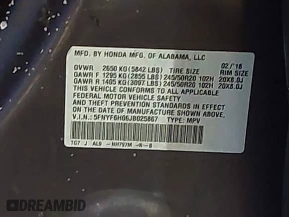 2018 Honda Pilot Elite z VIN 5FNYF6H06JB025867, wystawiony jako IAAI lot #41958994 z przebiegiem 94 479 mil mil oraz . Historia ofert i sprzedaży dostępna na DreamBid. Obrazek 9.