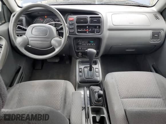 2003 Chevrolet Tracker с VIN 2CNBJ13C436937233, выставлен на аукционе Copart как лот 83109494 с пробегом 186 138 миль миль и Списание • Salvage title. История ставок и продаж доступна на DreamBid. Изображение 8.