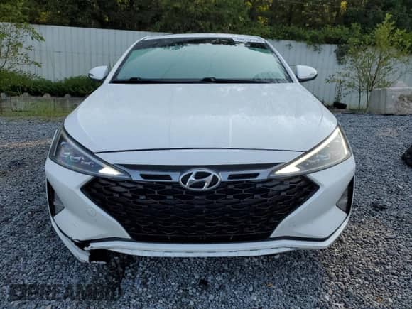 2020 Hyundai Elantra Sport z VIN KMHD04LB0LU979677, wystawiony jako Copart lot #68612155 z przebiegiem 61 149 mil mil oraz Szkoda całkowita • Salvage title. Historia ofert i sprzedaży dostępna na DreamBid. Obrazek 5.