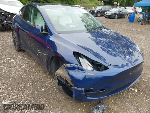 2022 Tesla Model Y Performance z VIN 7SAYGDEF1NF381579, wystawiony jako IAAI lot #42907318 z przebiegiem 78 749 mil mil oraz . Historia ofert i sprzedaży dostępna na DreamBid. Obrazek 6.